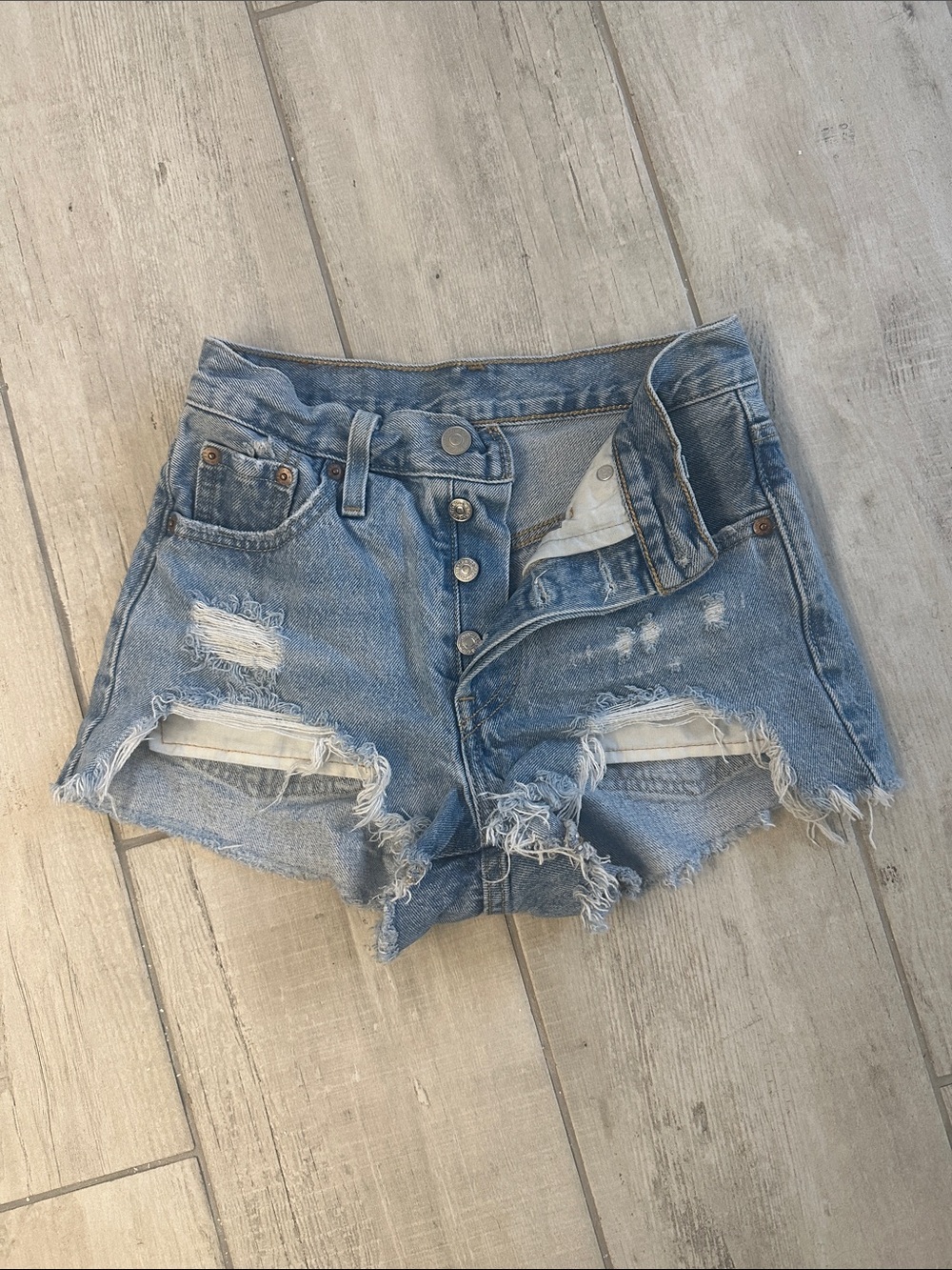 Levi's 501 Light Blue Distressed Button-Fly Denim Shorts